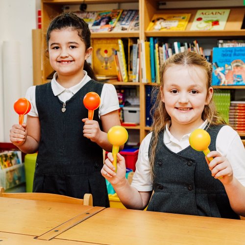 Red and Orange Plastic Maracas