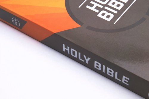 CSB Outreach Bible, Brown and Orange, Paperback, Easy-To-Read Text, Topical Subheadings, Frequently Asked Questions, Helpful Bible Passages