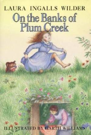 On The Banks Of Plum Creek By Laura Ingalls Wilder (Hardback)